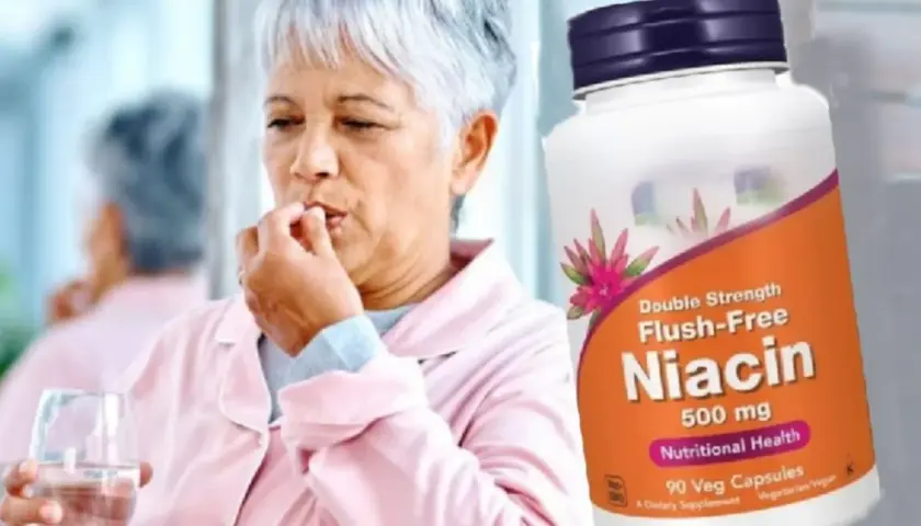 Mujer mayor toma una pastilla de niacina, que es vitamina B3 para que sirve en la salud nutricional.