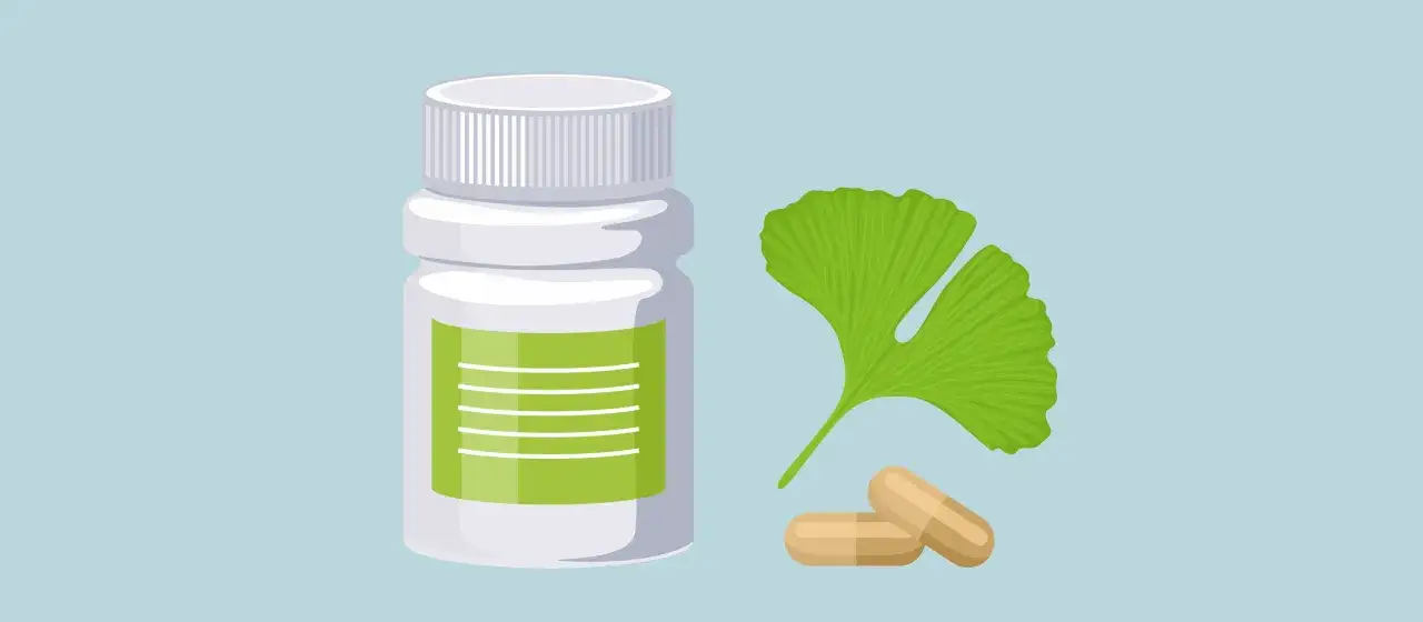 Frasco de suplemento, hoja de ginkgo y c&aacute;psulas. Descubre los ginkgo biloba beneficios para mujer.